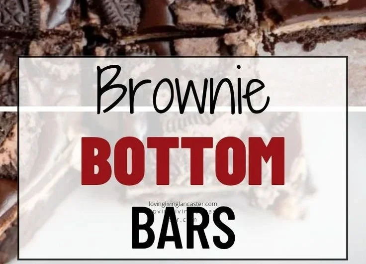 Decadent brownie bottom bars topped with creamy frosting and sprinkles