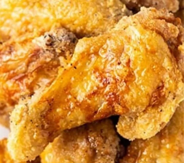 Crispy air fryer chicken wings served with dipping sauce