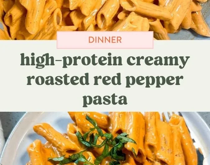 Creamy roasted red pepper pasta served in a bowl, topped with fresh herbs.