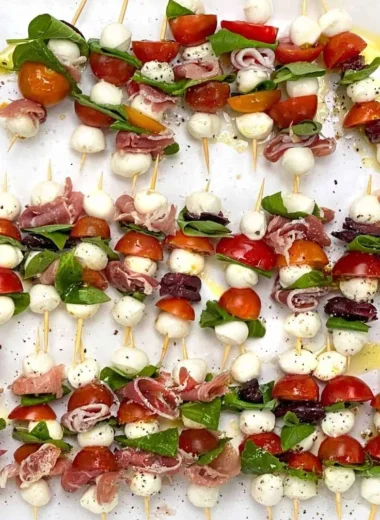 Mini Caprese Salad Skewers with cherry tomatoes, basil, and mozzarella