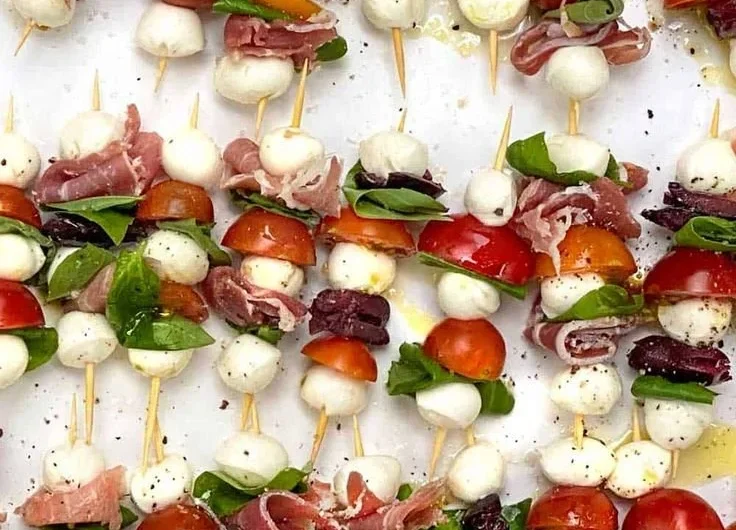 Mini Caprese Salad Skewers with cherry tomatoes, basil, and mozzarella