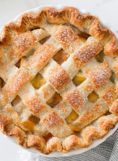 Delicious homemade apple pie with golden crust and fresh apple filling
