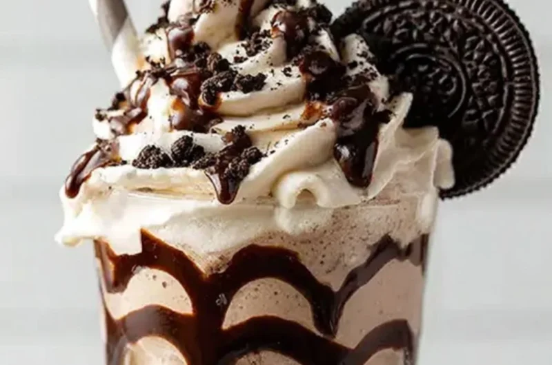Delicious Bailey's Cookies and Cream Shake topped with whipped cream and cookie crumbs.