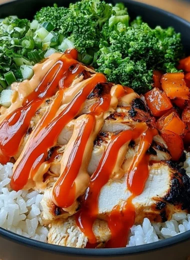 Colorful Bang Bang Chicken Bowl with vibrant veggies and sauce