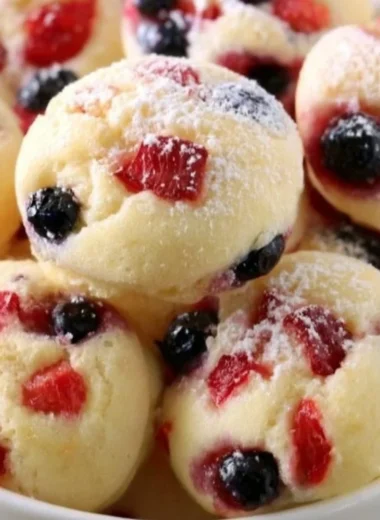 Delicious berry protein pancake bites stacked on a plate