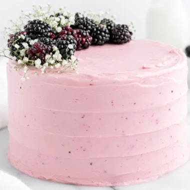 Deliciously layered Blackberry Layer Cake with fresh blackberries and creamy frosting.