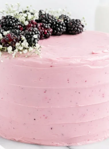 Deliciously layered Blackberry Layer Cake with fresh blackberries and creamy frosting.