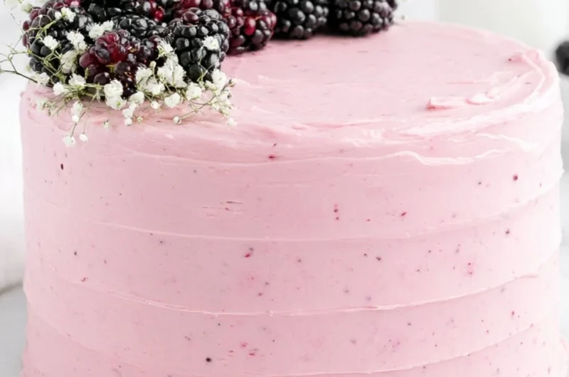 Deliciously layered Blackberry Layer Cake with fresh blackberries and creamy frosting.