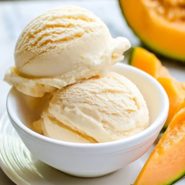 Creamy cantaloupe ice cream with sea salt served in a bowl