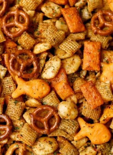 Bowl of Cheesy Ranch Chex Mix with crispy cereals and ranch seasoning