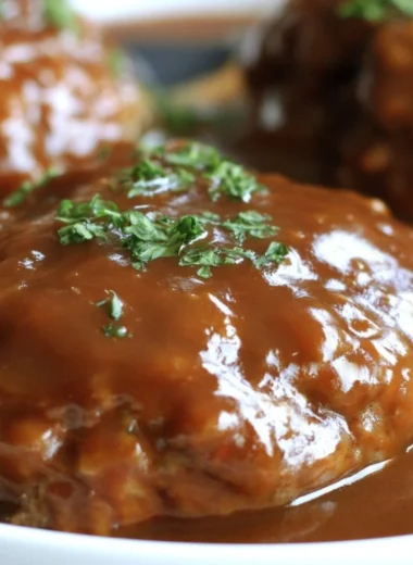 Delicious plate of Classic Salisbury Steak with gravy and sides