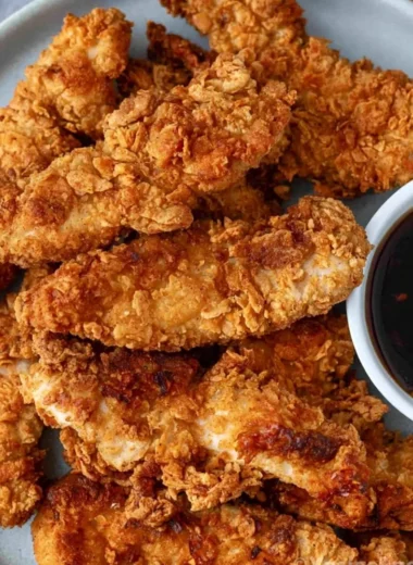 Crispy honey garlic chicken tenders served with a honey dipping sauce