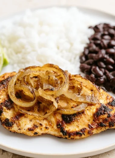 Cuban Grilled Chicken served with fresh sides and vibrant colors