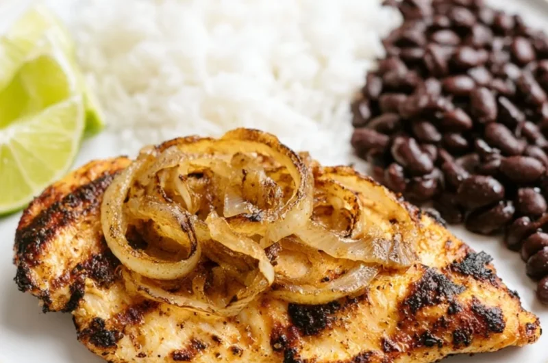 Cuban Grilled Chicken served with fresh sides and vibrant colors