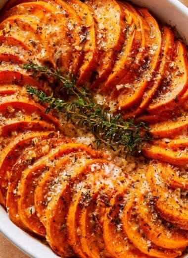Delicious Garlic Parmesan Roasted Sweet Potatoes served in a dish
