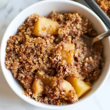 Delicious healthy apple crumble dessert with a golden topping