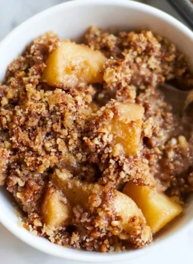 Delicious healthy apple crumble dessert with a golden topping