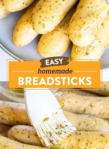 Homemade garlic herb breadsticks arranged on a plate, ready to serve.