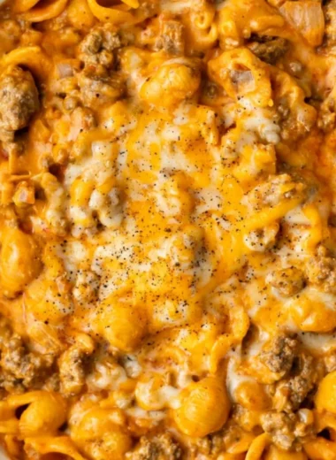 A delicious bowl of homemade Hamburger Helper served with fresh ingredients.