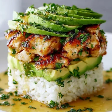 Delicious Honey Lime Chicken Avocado Rice Stack served on a plate