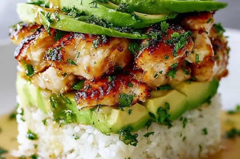 Delicious Honey Lime Chicken Avocado Rice Stack served on a plate