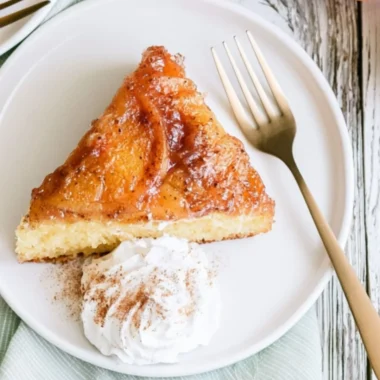 Delicious Peach Upside Down Cake topped with caramelized peaches.