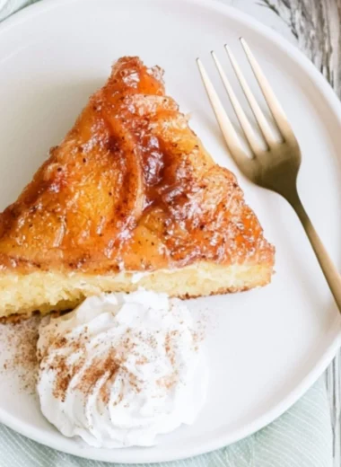 Delicious Peach Upside Down Cake topped with caramelized peaches.