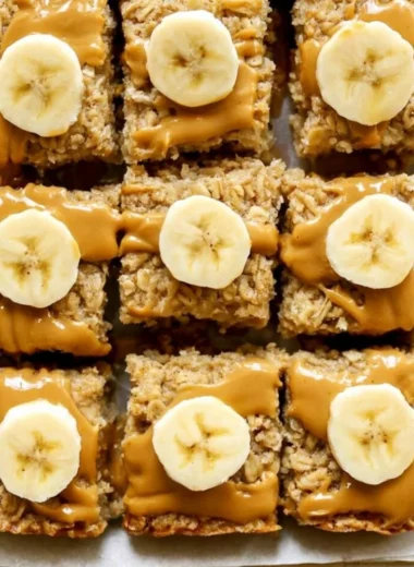 Delicious Peanut Butter Banana Baked Oatmeal served in a bowl with sliced bananas on top