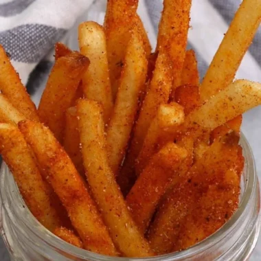 Delicious homemade Popeyes Cajun Fries recipe served hot and crispy.