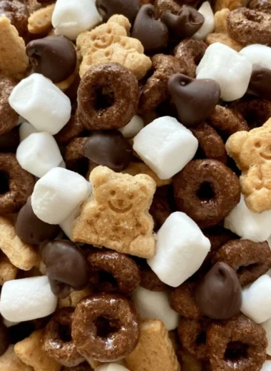 Delicious S'mores Trail Mix with chocolate, marshmallows, and graham crackers.