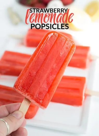 Delicious Strawberry Lemonade Popsicles on a sunny day