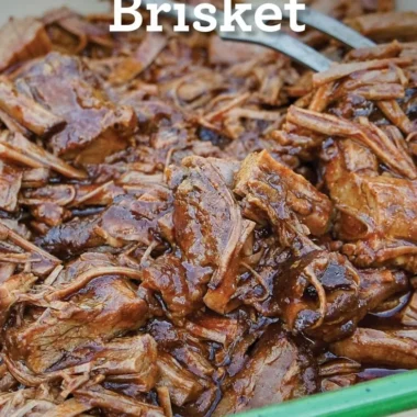 Texas Cola Shredded Beef Brisket served with a side of barbecue sauce