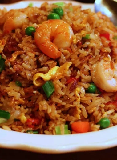 Plate of Asian restaurant-inspired fried rice with vegetables and eggs