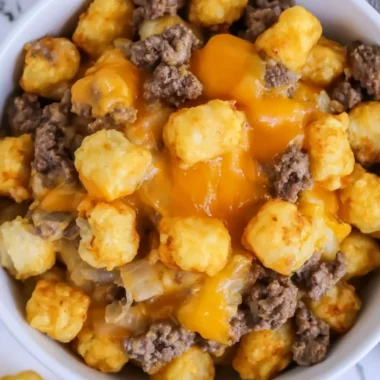 Delicious cheesy Tater Tot Casserole topped with crispy tater tots