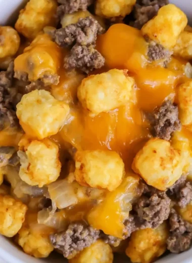 Delicious cheesy Tater Tot Casserole topped with crispy tater tots