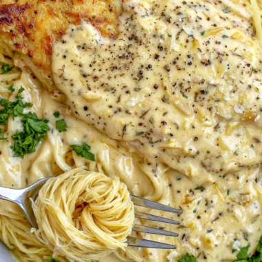 Cozy Crock Pot Angel Chicken dish served in a bowl with herbs