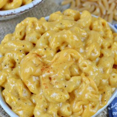 Cozy crock pot macaroni and cheese in a warm serving bowl