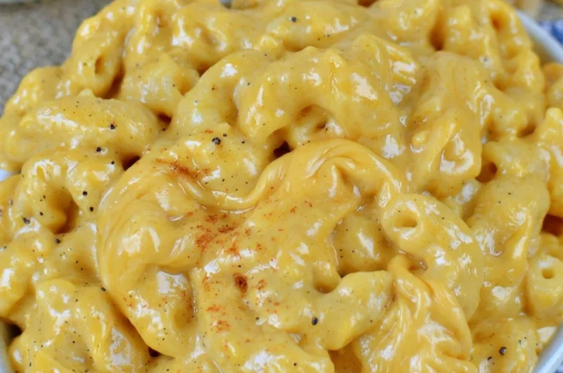 Cozy crock pot macaroni and cheese in a warm serving bowl