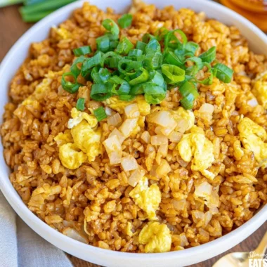Delicious Hibachi Fried Rice served in a cozy setting with colorful vegetables and shrimp.