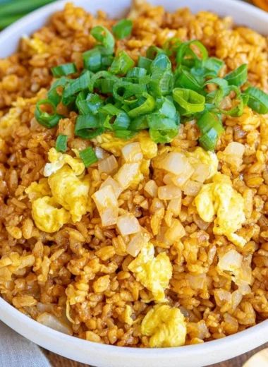 Cozy homemade hibachi fried rice dish with vegetables and proteins