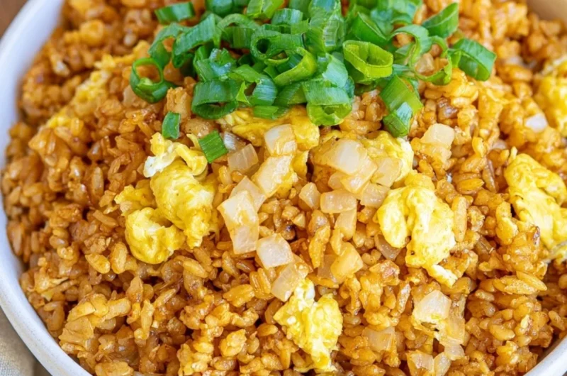 Cozy homemade hibachi fried rice dish with vegetables and proteins
