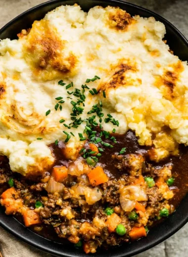 Homemade Shepherd's Pie topped with creamy mashed potatoes and comforting ingredients.