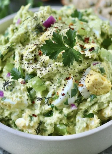 Herby avocado egg salad served in a bowl, perfect for a quick lunch
