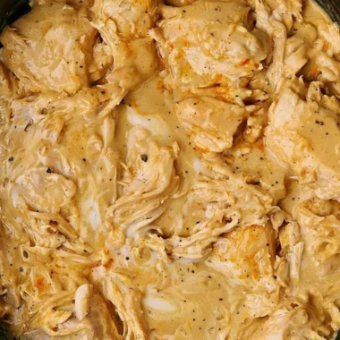 Low cooker chicken breasts served with rich gravy