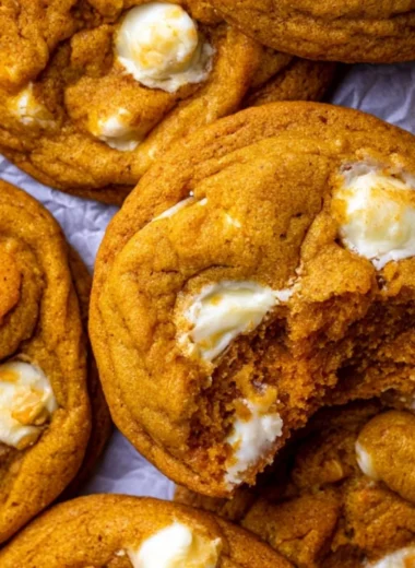 Homemade Pumpkin White Chocolate Chip Cookies on a cooling rack