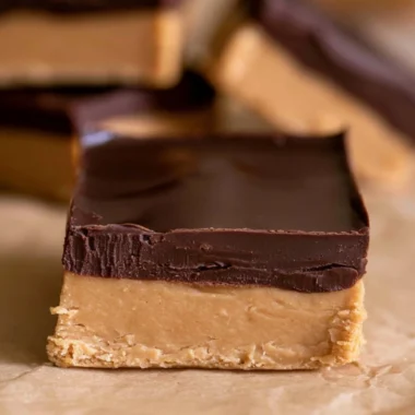Homemade Buckeye Bars with chocolate and peanut butter topping
