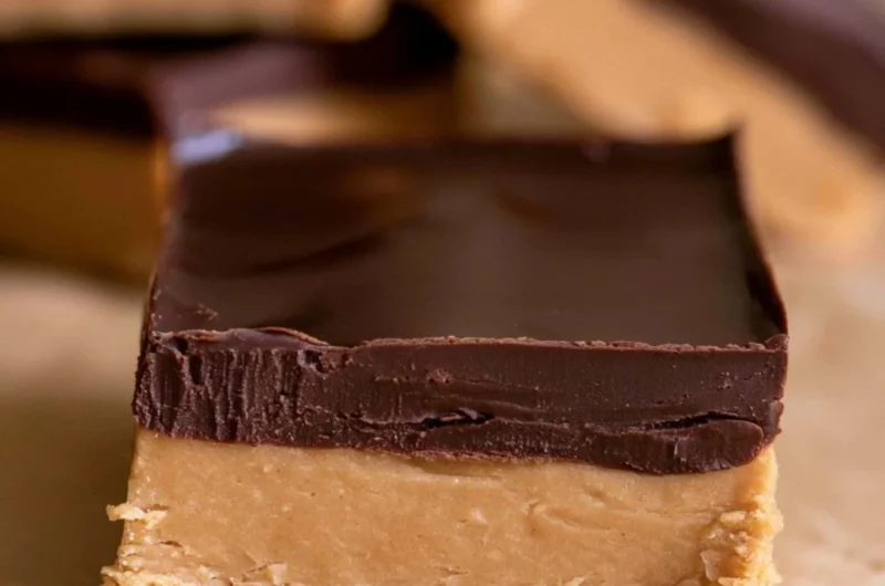 Homemade Buckeye Bars with chocolate and peanut butter topping