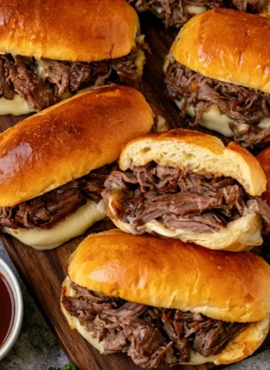 Cozy Crockpot French dip sandwiches with tender beef and au jus