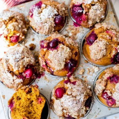 Delicious pumpkin spice cranberry muffins fresh out of the oven