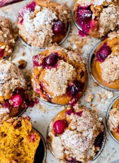 Delicious pumpkin spice cranberry muffins fresh out of the oven